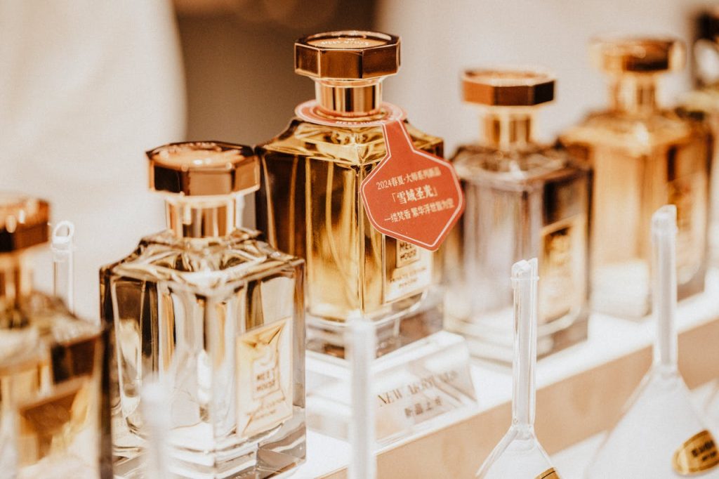 pexels photo 28664171 Elegant collection of perfume bottles showcasing luxury fragrances in a stylish retail display.